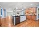 Spacious kitchen with island, hardwood floors, and modern cabinetry at 131 Gold Springs Ct, Canton, GA 30114