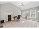 Home office with built in shelving and large windows at 131 Gold Springs Ct, Canton, GA 30114