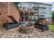 Relaxing patio with fire pit and comfortable seating at 131 Gold Springs Ct, Canton, GA 30114