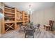 Basement wine cellar with custom wooden shelving and wine rack at 131 Gold Springs Ct, Canton, GA 30114