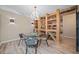 Basement wine cellar with built in wooden shelving at 131 Gold Springs Ct, Canton, GA 30114