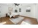 Bright bedroom with hardwood floors and neutral decor at 3302 Mixon Way, Stone Mountain, GA 30087