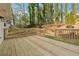 New deck overlooking a wooded backyard at 3302 Mixon Way, Stone Mountain, GA 30087