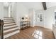 Bright entryway with hardwood floors and modern storage at 3302 Mixon Way, Stone Mountain, GA 30087