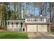 Charming ranch home with two-car garage and inviting front porch at 3302 Mixon Way, Stone Mountain, GA 30087