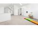 Spacious bonus room with carpet, multiple doors, and bright light at 3930 Peachtree Dunwoody Ne Rd, Atlanta, GA 30342