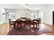 Bright dining room with hardwood floors, a fireplace, and ample natural light at 3930 Peachtree Dunwoody Ne Rd, Atlanta, GA 30342