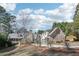 Beautiful brick home with attached garages and mature trees in a lovely neighborhood at 3930 Peachtree Dunwoody Ne Rd, Atlanta, GA 30342
