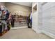 Walk-in closet with wire shelving and shoe storage at 3930 Peachtree Dunwoody Ne Rd, Atlanta, GA 30342