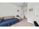 Cozy bedroom featuring a comfortable daybed with blue bedding and neutral walls at 3695 Townley Ln, Cumming, GA 30040