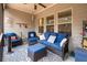 Relaxing covered deck with comfortable seating and outdoor decor at 3695 Townley Ln, Cumming, GA 30040