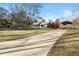 House exterior showing driveway and landscaping at 281 Orchard Dr, Canton, GA 30115