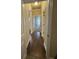 Bright hallway with hardwood floors at 922 Golden Meadows Ln, Loganville, GA 30052