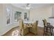 Cozy breakfast nook features natural light from the large windows at 5450 Taylor Rd, Johns Creek, GA 30022