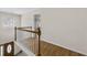 Second-floor foyer with hardwood floors and a view of the front door at 5450 Taylor Rd, Johns Creek, GA 30022