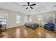 Spacious main bedroom with hardwood floors, trey ceilings, lots of light from large windows at 5450 Taylor Rd, Johns Creek, GA 30022