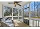 Inviting screened porch featuring brick pavers and offering peaceful outdoor relaxation at 5450 Taylor Rd, Johns Creek, GA 30022