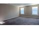 Spacious bedroom featuring neutral carpeting, natural light and fresh paint at 2733 Madison Mae Ln, Grayson, GA 30017
