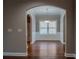 Elegant dining room with hardwood floors, wainscoting, and a modern chandelier at 2733 Madison Mae Ln, Grayson, GA 30017
