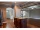 Open-concept kitchen island view leading into living area with hardwood floors and ample natural light at 2733 Madison Mae Ln, Grayson, GA 30017