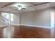 Spacious living room with hardwood floors and neutral walls at 2733 Madison Mae Ln, Grayson, GA 30017