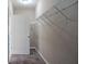 Walk-in closet with metal shelving offers ample storage space, keeping your wardrobe organized and accessible at 2733 Madison Mae Ln, Grayson, GA 30017