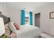 Charming bedroom featuring bright, natural light and a walk-in closet at 305 Sound Cir, Stockbridge, GA 30281