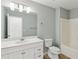 Clean bathroom with single vanity and shower/tub combo at 4345 Settlers Grove Rd, Cumming, GA 30028