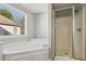 Bathroom with corner soaking tub and separate shower at 4345 Settlers Grove Rd, Cumming, GA 30028