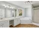 Spacious bathroom with double vanity, soaking tub, and separate shower at 4345 Settlers Grove Rd, Cumming, GA 30028
