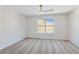 Bright bedroom with window and ceiling fan at 4345 Settlers Grove Rd, Cumming, GA 30028