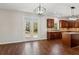 Bright dining area with hardwood floors and French doors at 4345 Settlers Grove Rd, Cumming, GA 30028