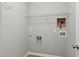 Laundry room with shelving and hookups at 4345 Settlers Grove Rd, Cumming, GA 30028