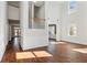 Spacious living room with hardwood floors and high ceilings at 4345 Settlers Grove Rd, Cumming, GA 30028