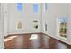 Bright living room with hardwood floors and large windows at 4345 Settlers Grove Rd, Cumming, GA 30028