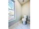 Small bathroom with toilet and window at 110 Randomwood Way, Alpharetta, GA 30022