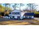 Attractive two-story home with white siding and black shutters at 110 Randomwood Way, Alpharetta, GA 30022