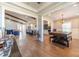 Bright dining room with a rustic table and hardwood floors at 2418 Claude Brewer Road Rd, Loganville, GA 30052