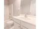 Clean bathroom with white vanity and shower/tub combo at 335 Wilma Sw Ct, Atlanta, GA 30331