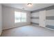 Bedroom with gray and white striped accent wall at 335 Wilma Sw Ct, Atlanta, GA 30331