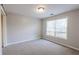 Spacious bedroom with neutral walls and carpeted floor at 335 Wilma Sw Ct, Atlanta, GA 30331