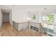 Upstairs hallway with hardwood floors, modern lighting fixtures, and views of the two-story foyer at 3661 Clubwood Trl, Marietta, GA 30068
