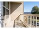 Apartment balcony with view of trees and parking at 4805 West Village Way # 3207, Smyrna, GA 30080