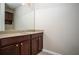 Bathroom with vanity, cabinet and large mirror at 4805 West Village Way # 3207, Smyrna, GA 30080