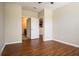 Empty bedroom with neutral walls and a view to the bathroom and kitchen at 4805 West Village Way # 3207, Smyrna, GA 30080