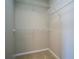 Walk-in closet with built-in shelving for ample storage and organization at 4805 West Village Way # 3207, Smyrna, GA 30080
