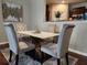 Dining area with a stylish table, upholstered chairs, and modern decor at 4805 West Village Way # 3207, Smyrna, GA 30080