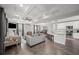 Spacious living room featuring recessed lighting, coffered ceilings, and an open floor plan at 679 Mcwilliams Se Rd, Atlanta, GA 30315