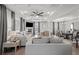 Bright living room featuring coffered ceilings, a fireplace, and neutral decor throughout at 679 Mcwilliams Se Rd, Atlanta, GA 30315