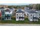 Street view of new construction homes with black fence and front yards at 679 Mcwilliams Se Rd, Atlanta, GA 30315
